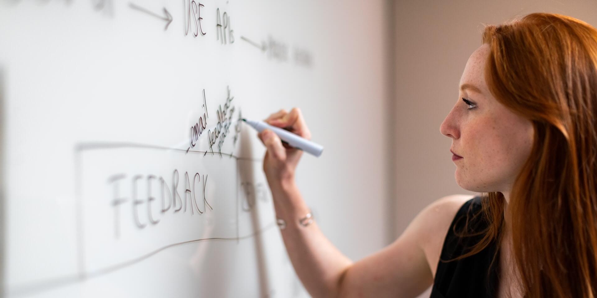 administrator at a whiteboard