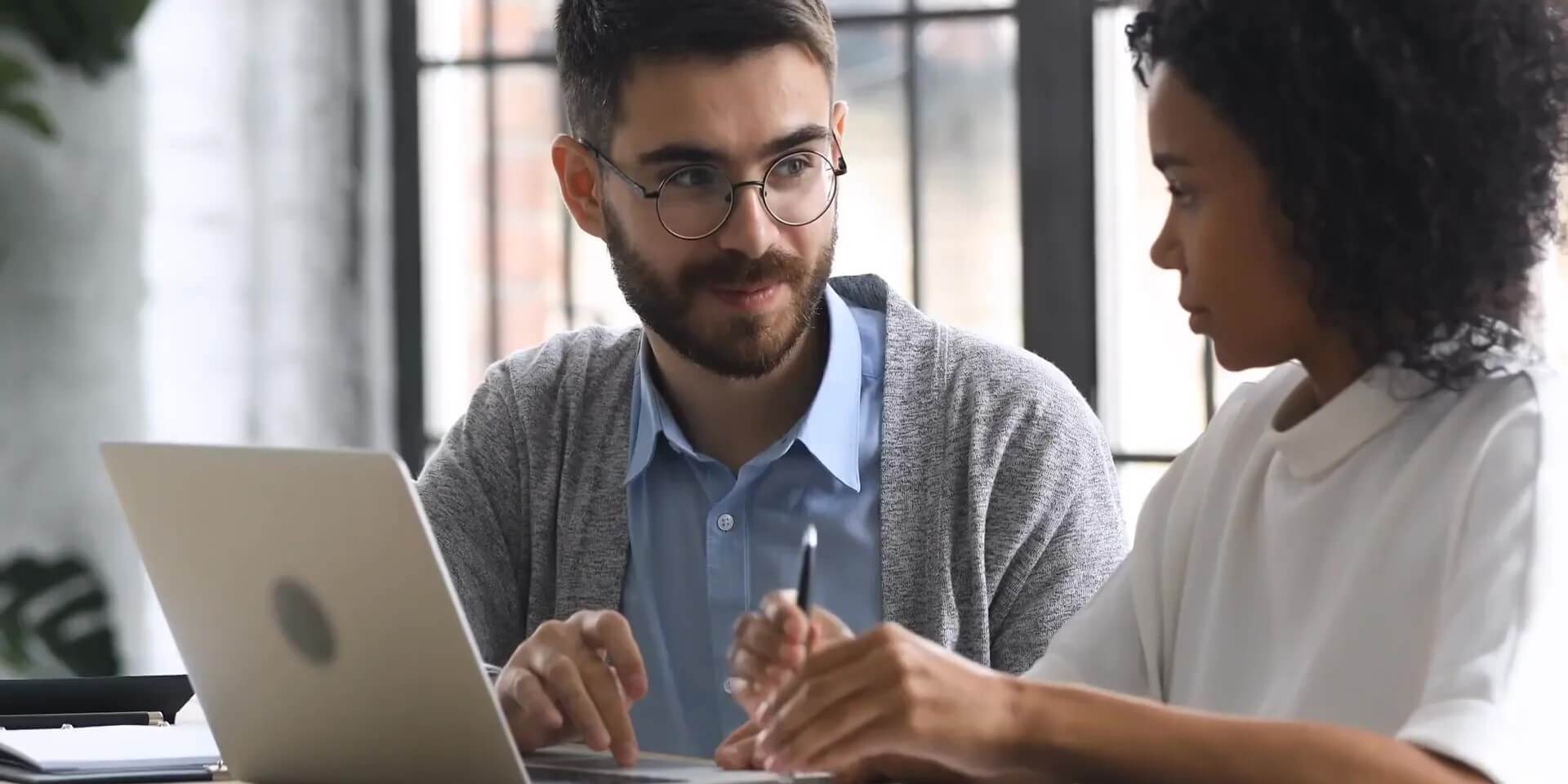 a teacher helps a student study