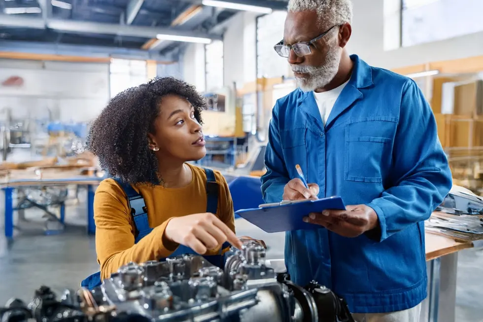 student working on engine